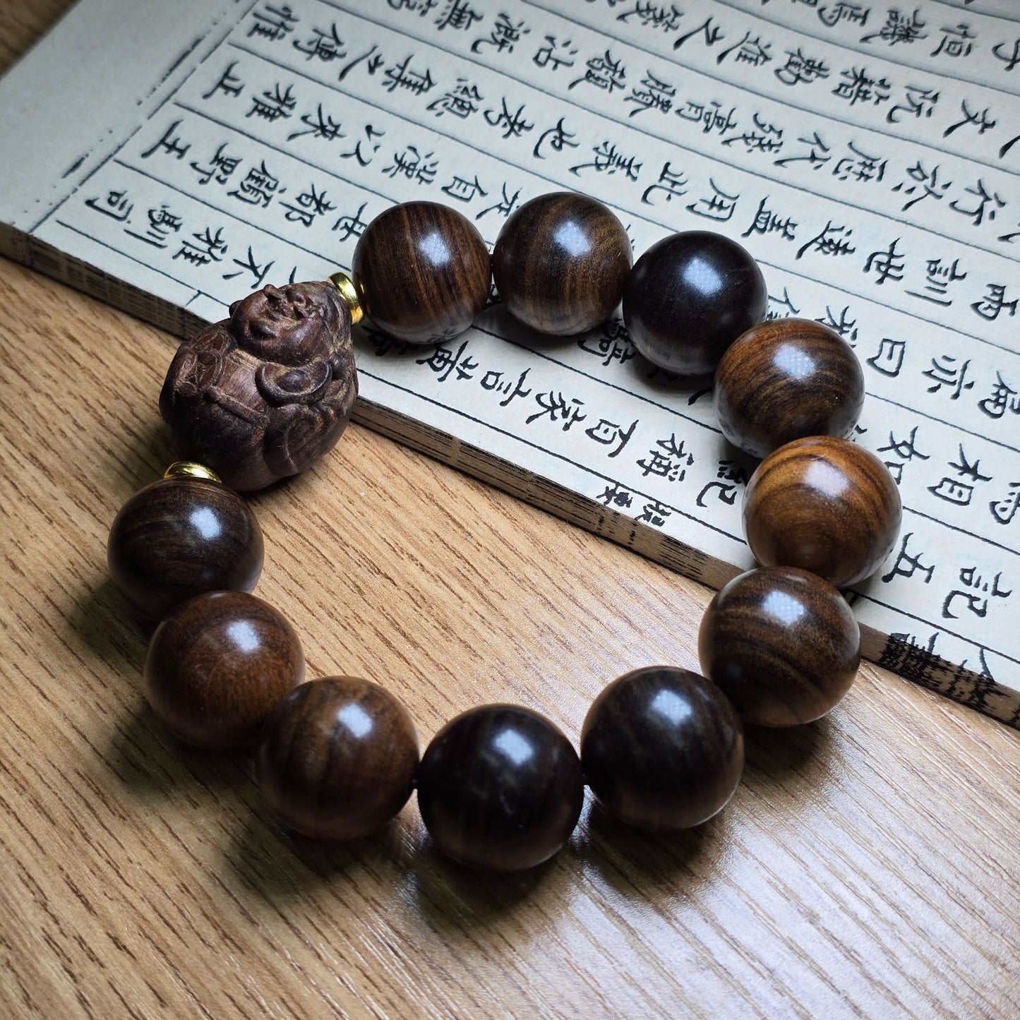 【18】20mm Artisan Dark Wood Beaded Bracelet – Hand-Carved Smiling Zen Figure Accent